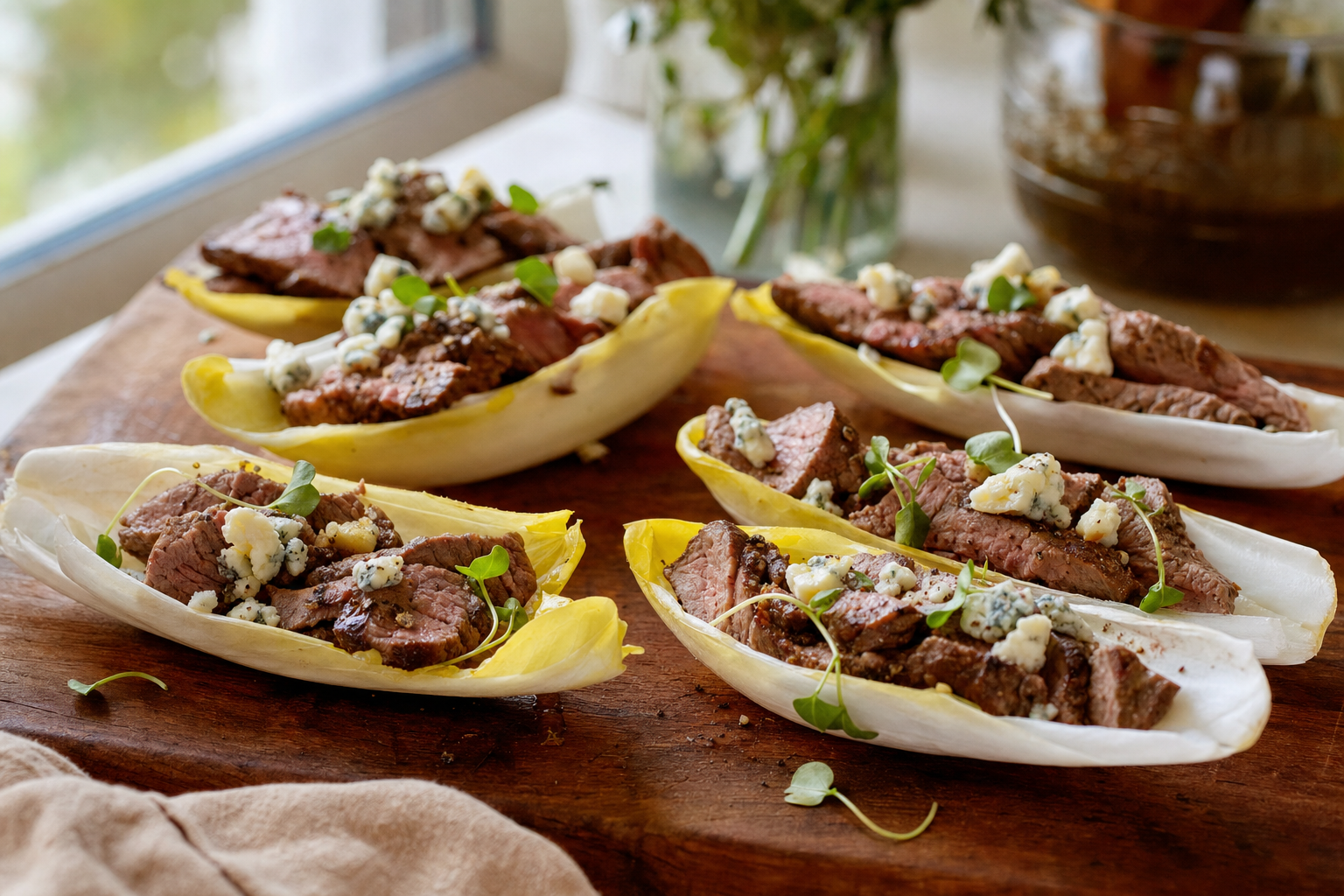 Peppercorn Beef Endive Boats